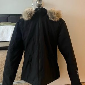 Black women’s Spyder Vida insulated ski jacket with fur hood size 4